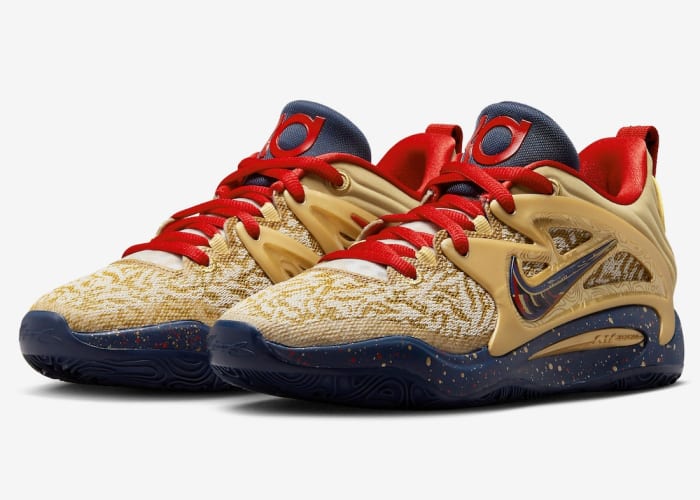 View of gold, navy, and red Nike KD shoes.